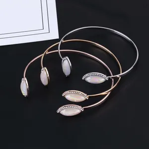 Minimalist women's open cuff bangle set in gold, silver, and rose gold finishes