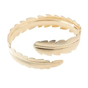 Elegant gold-tone leaf feather open cuff bracelet for women with detailed texture.