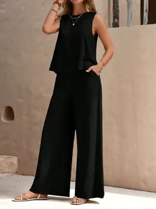 Full-body detail view of black sleeveless top and wide-leg pants two-piece cotton set