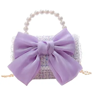 Sac à main élégant en tweed violet pour filles avec grand nœud et poignée en perles