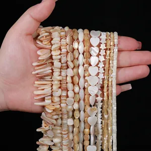 Natural mother of pearl shell beads collection in heart, star, and bamboo shapes