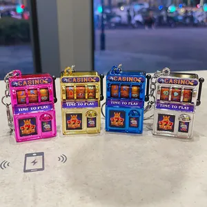 Set of four colorful electroplated mini slot machine keychains for bag decoration stress relief