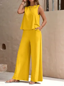 Stylish yellow casual two-piece sleeveless top and wide-leg pants set for women summer.