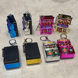 Multi-colored electroplated mini slot machine keychains with a retro lever design