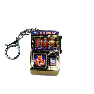 Retro gold electroplated slot machine keychain with 777 slots casino theme design