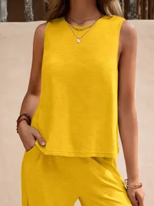 Casual yellow sleeveless crew neck top and matching trousers two-piece cotton set