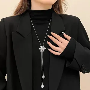 Elegant rotating snowflake long sweater chain necklace in silver titanium steel finish