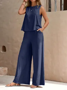 Detailed view of women's navy blue cotton two-piece set with sleeveless top and wide pants