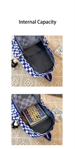 Internal view of blue checkered backpack showing spacious compartment for tablet