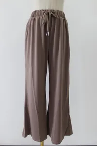 Comfortable loose brown wide leg travel pants with elastic drawstring waist for summer