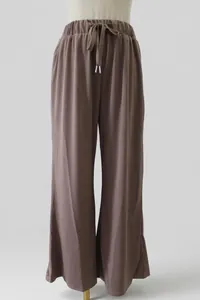 Comfortable loose brown wide leg travel pants with elastic drawstring waist for summer