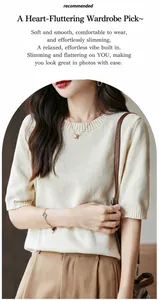 Dettaglio di un elegante t-shirt in maglia crema su una modella con luce soffusa