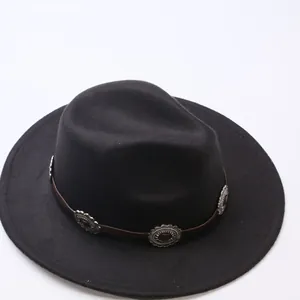 Close-up of black wool felt fedora hat with brown band and silver floral ornaments