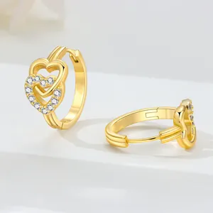 Detailed view of gold-plated hoop earrings featuring interlocking pave stone hearts