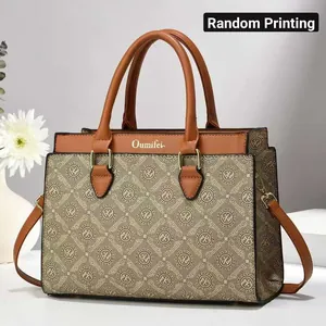 Large capacity commuter handbag featuring a classic patterned design and sturdy brown handles