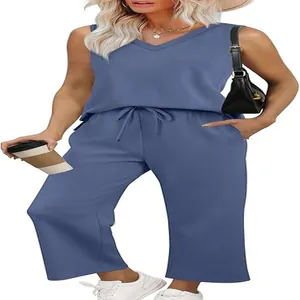 Stylish women's blue summer two-piece set featuring V-neck tank top and wide-leg pants