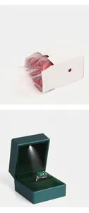Premium LED light jewelry box for rings including protective white paper sleeve