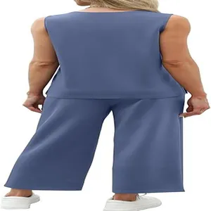 Back view of a blue women's summer travel set featuring a vest and wide-leg pants.