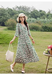 Elegant mid-sleeve cotton silk floral dress perfect for summer vacations and beach