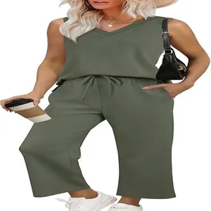 Detail showing olive green V-neck sleeveless tank top and matching wide-leg casual pants set