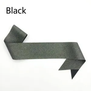 Glittering black blank sash for parties and awards ceremonies shown on white background