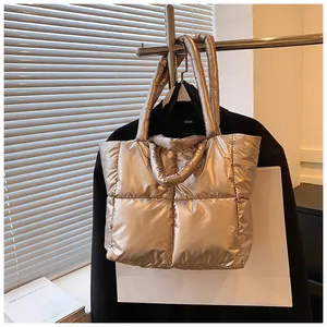 Champagne metallic quilted down tote bag for winter fashion and daily commuting