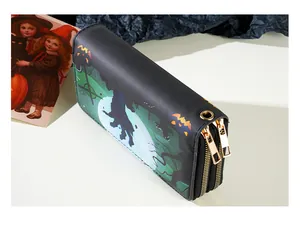 Detailed view of Halloween printed double-zipper long wallet with pumpkin design