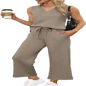 Close-up detail of women's sleeveless V-neck top paired with comfortable wide-leg pants