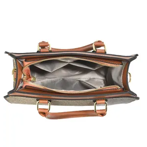 Spacious brown women's commuting handbag with multiple interior pockets and zipper