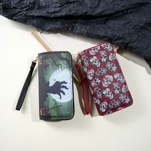 Detail view of Halloween themed long wallets with skull rose and zombie hand prints