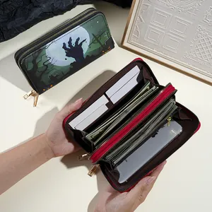 Interior detail of Halloween double zipper wallet showing large capacity for cards and phone.