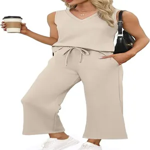 Women's 2-piece beige summer travel set with V-neck tank top and wide-leg pants