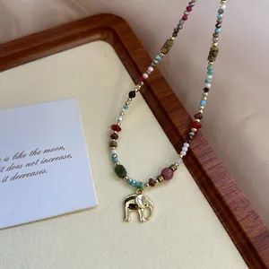 Handmade natural stone beaded necklace featuring a lucky golden elephant charm pendant