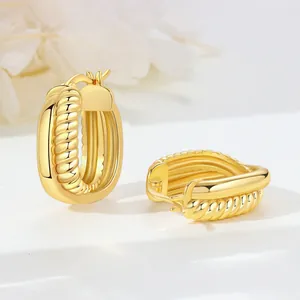 Detailed view of 18K gold plated chunky hoop earrings with twisted rope texture