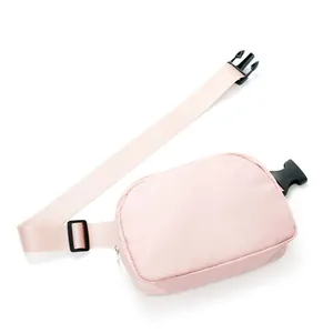 Pink waterproof nylon outdoor waist bag with adjustable strap and black buckle.