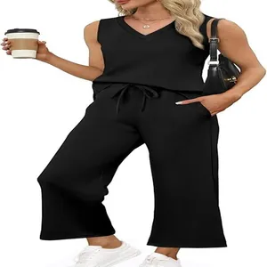 Chic black women's summer travel set featuring V-neck tank top and comfy wide-leg pants