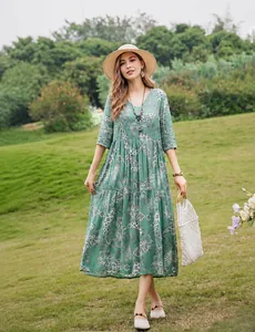 Elegant green paisley midi dress with half sleeves for summer casual beach wear.