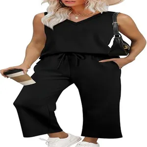Women's black sleeveless V-neck top and matching cropped pants travel set