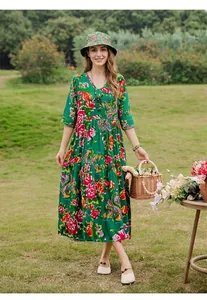 Elegant green floral cotton silk midi dress with mid-sleeves for summer beach lifestyle