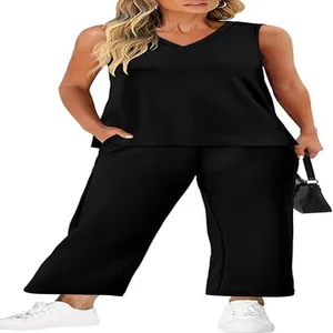 Detail view of women's black V-neck tank top and matching wide-leg casual pants set