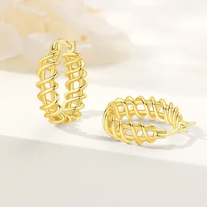 Elegant 18K gold plated hollow twisted cage hoop earrings with high-end texture