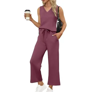 Full view of women's mauve V-neck tank top and wide-leg casual pants travel set