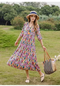 Elegant floral print midi dress for women with half sleeves for summer beach wear.