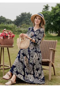 Elegant summer cotton silk floral maxi dress with mid-length sleeves and straw hat