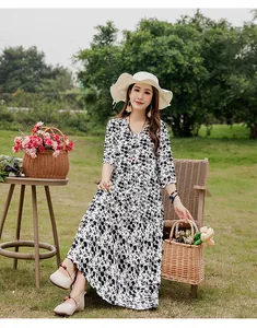 Elegant black and white floral cotton silk maxi dress with mid-sleeves for summer beach