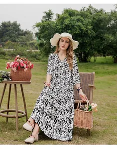 Elegant black and white floral cotton silk maxi dress with mid-sleeves for summer beach