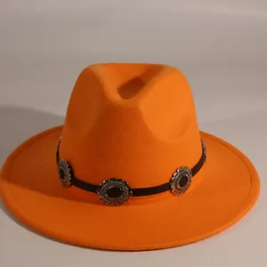 Detail view of orange felt fedora hat with silver floral metal band decoration