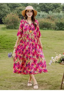 Elegant floral print cotton rayon dress with mid-sleeves, perfect for summer beach leisure