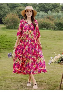 Elegant floral print cotton rayon dress with mid-sleeves, perfect for summer beach leisure