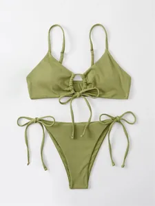 Detailed view of olive green ribbed triangle bikini with adjustable drawstrings